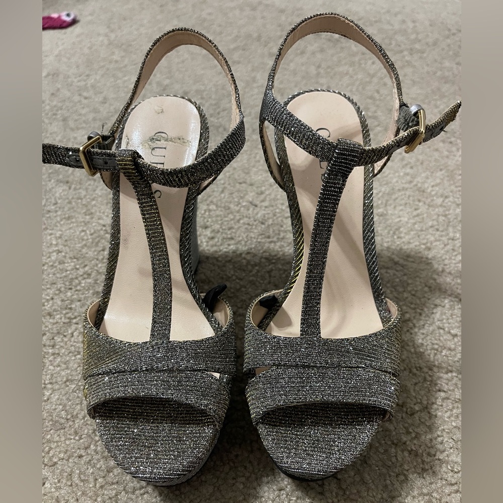 Black and gold wedge heels